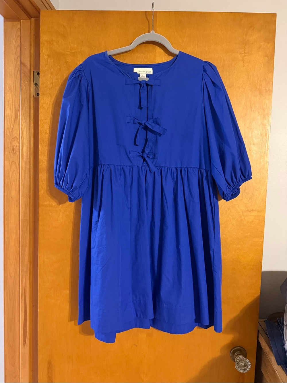 Women’s puff sleeve royal blue babydoll dress with bow tie front- size L
